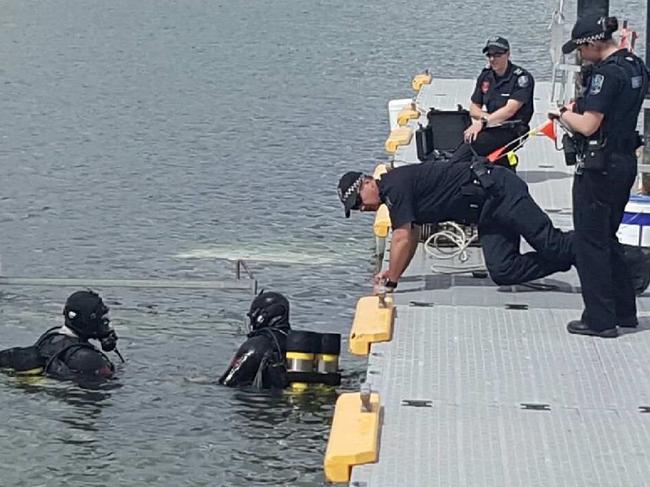 SA Police divers with a car dumped into the ocean at the Port Augusta boat ramp.