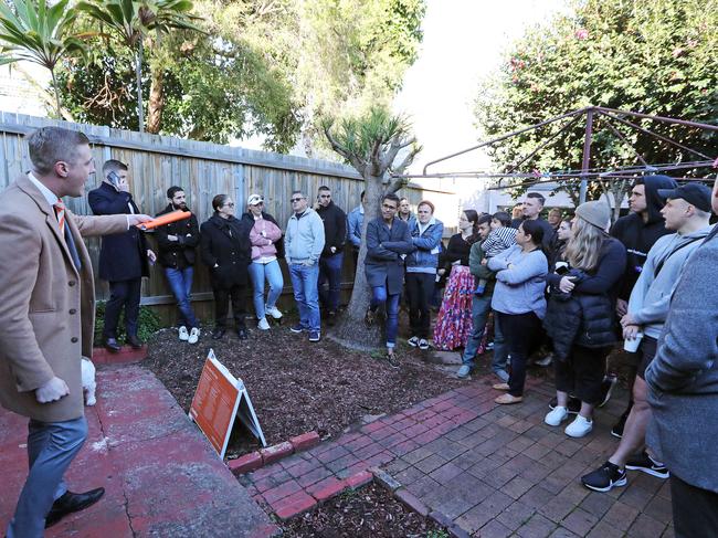 Big auction crowds are pushing prices up in many cities. Picture: Tim Hunter.