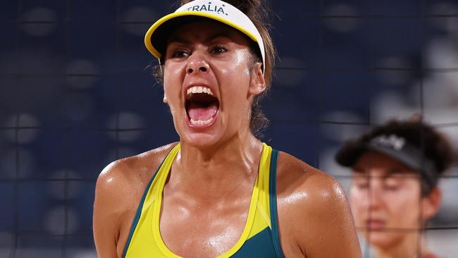 TOKYO, JAPAN - AUGUST 03: Taliqua Clancy #2 of Team Australia reacts as she competes against Melissa Humana-Paredes #2 of Team Canada during the Women's Quarterfinal beach volleyball on day eleven of the Tokyo 2020 Olympic Games at Shiokaze Park on August 03, 2021 in Tokyo, Japan. (Photo by Sean M. Haffey/Getty Images)