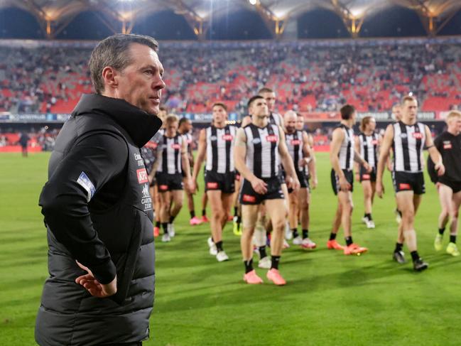 Craig McRae waits for his players after their loss to Gold Coast. Picture: Russell Freeman/AFL Photos via Getty Images