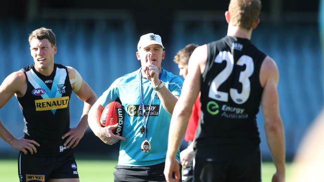 Michael Voss (Assistant Coach, Port Adelaide) with players Brad Ebert (left) and Matthew Lobbe (right). Port Adelaide football training at Adelaide Oval this morning. Picture: Stephen Laffer