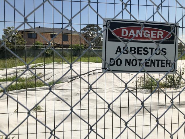 Asbestos has been dumped near play equipment at Wilson Park, Bonnyrigg. Fairfield Council fenced it off about six months ago, however it is still there. Picture: Tony Ibrahim