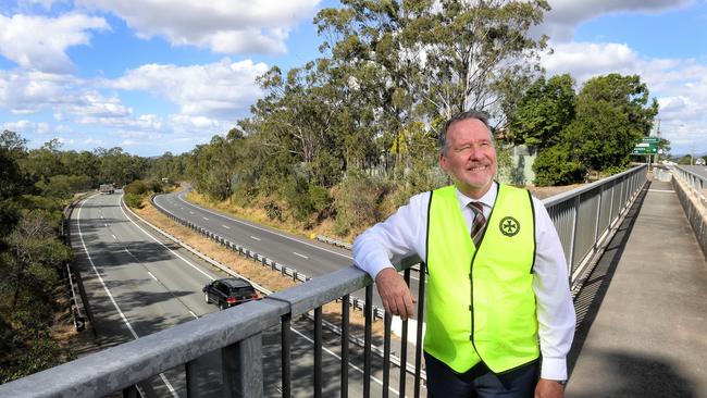 Ipswich West MP Jim Madden standing above the Warrego Highway.