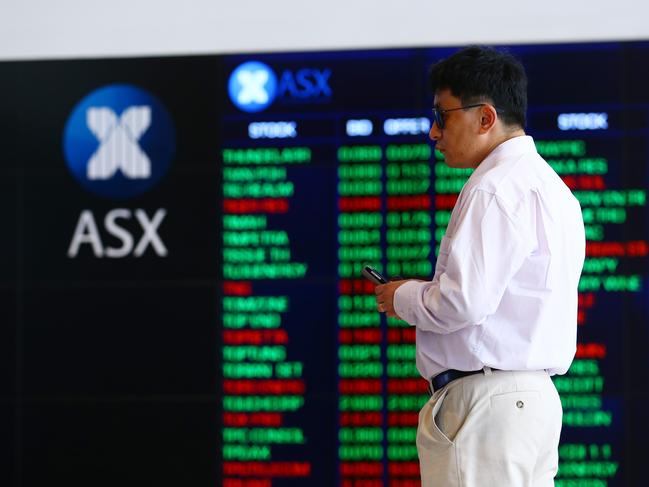 11/01/2016. Investors watch the market indicator boards at the Australian Stock Exchange (ASX) in Sydney. The Australian share market is on the back foot for a sixth straight day as local investors wait anxiously for the start of trade in China. Britta Campion / The Australian.