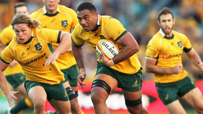 SYDNEY, AUSTRALIA - JUNE 21: Wycliff Palu of the Wallabies runs the ball during the International Test match between the Australia Wallabies and France at Allianz Stadium on June 21, 2014 in Sydney, Australia. (Photo by Brendon Thorne/Getty Images)