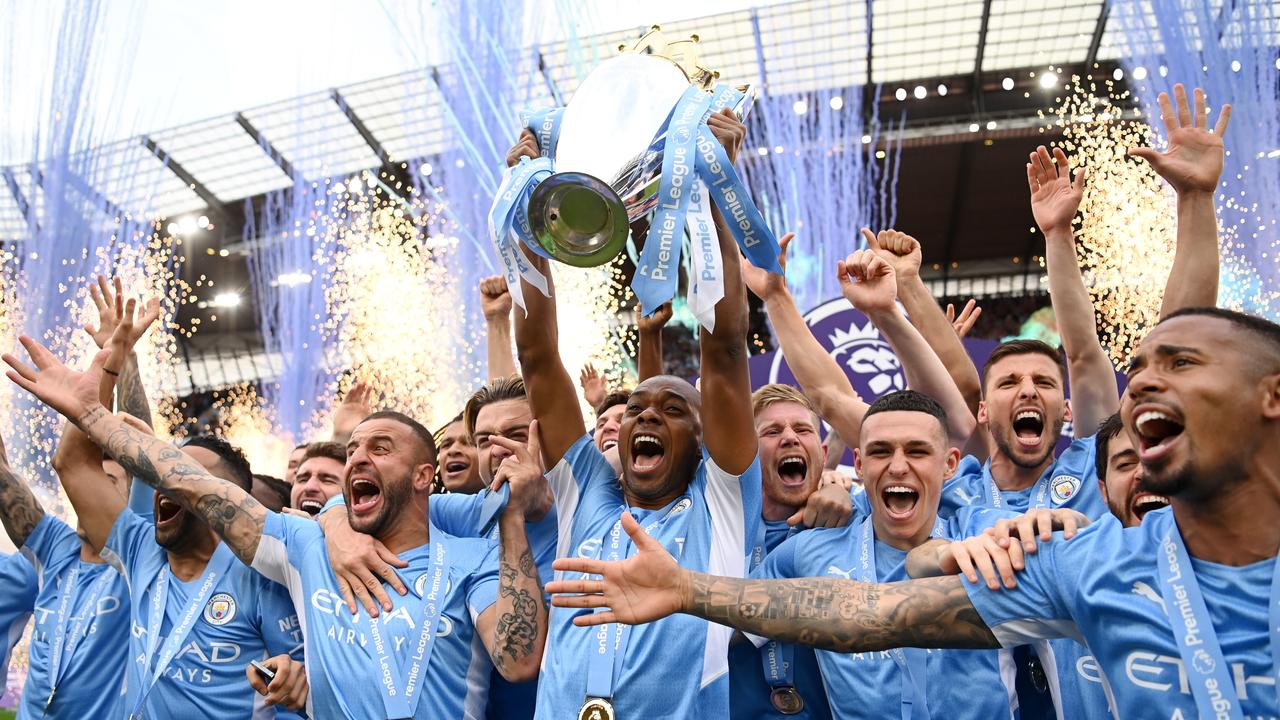 Manchester City celebrate winning the title. (Photo by Michael Regan/Getty Images)