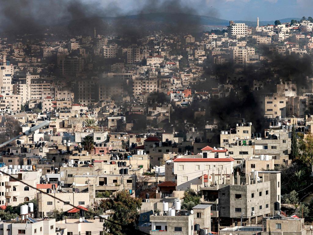 Smoke rises from an area in Jenin in the occupied West Bank during a large-scale Israeli army operation on January 24. Picture: Jaafar Ashtiyeh/AFP