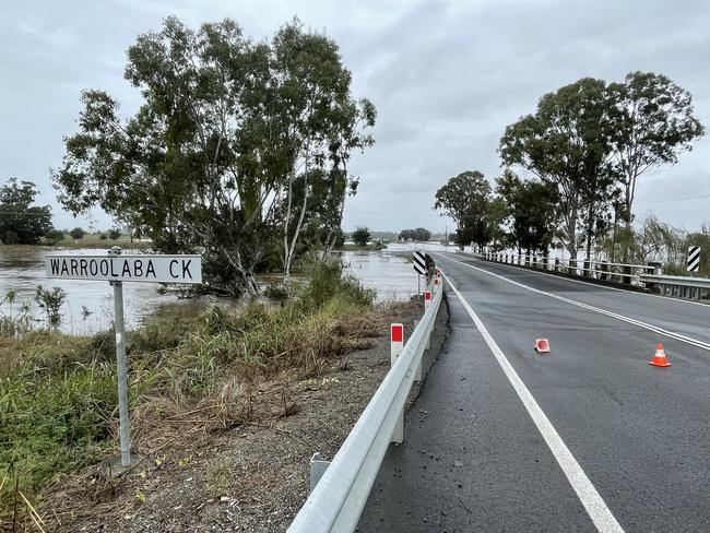 The Cunningham Hwy remained closed at Warroolaba Creek at 12.30pm. Picture: Jordan Philp