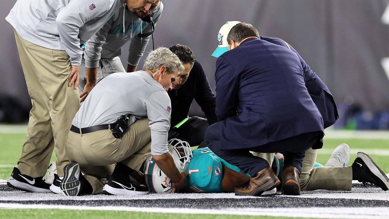 CINCINNATI, OHIO - SEPTEMBER 29: Medical staff tend to quarterback Tua Tagovailoa #1 of the Miami Dolphins after an injury during the 2nd quarter of the game against the Cincinnati Bengals at Paycor Stadium on September 29, 2022 in Cincinnati, Ohio. Andy Lyons/Getty Images/AFP