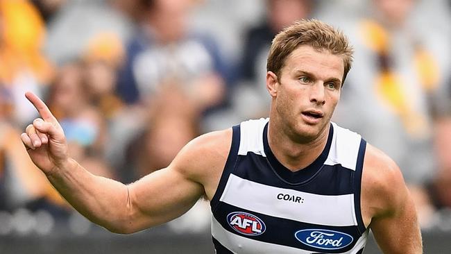 Lachie Henderson celebrates kicking a goal for Geelong in 2017. Picture: Quinn Rooney/Getty Images.