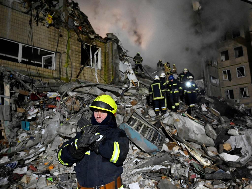 Rescuers work on a residential building destroyed after a missile strike, in Dnipro amid the Russian invasion of Ukraine. Picture: AFP