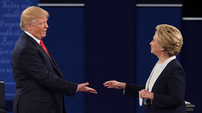 US Democratic presidential candidate Hillary Clinton and US Republican presidential candidate Donald Trump shakes hands after the second presidential debate on October 9, 2016. Picture: AFP