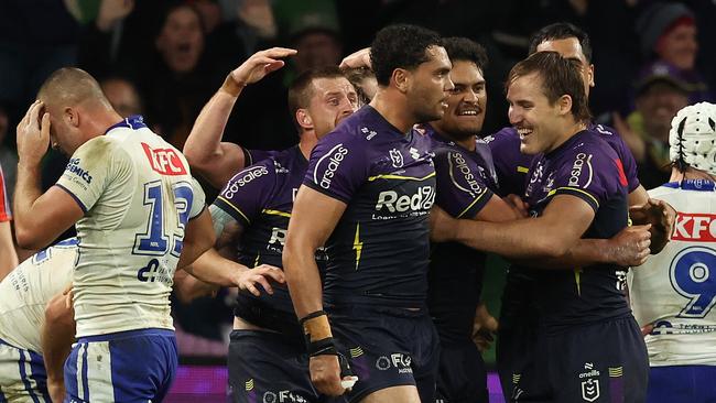 MELBOURNE, AUSTRALIA - APRIL 12: Shawn Blore of the Storm celebrates after scoring a try during the round six NRL match between Melbourne Storm and Canterbury Bulldogs at AAMI Park, on April 12, 2024, in Melbourne, Australia. (Photo by Robert Cianflone/Getty Images)