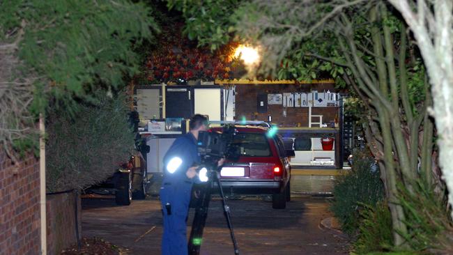  Police at the scene of the Hodsons’ murder. Picture: Darren Mcnamara 