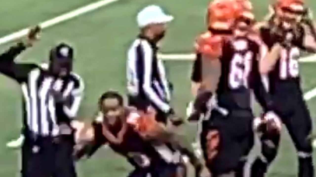 Joe Mixon celebrated by hurling his helmet... right into a referee.