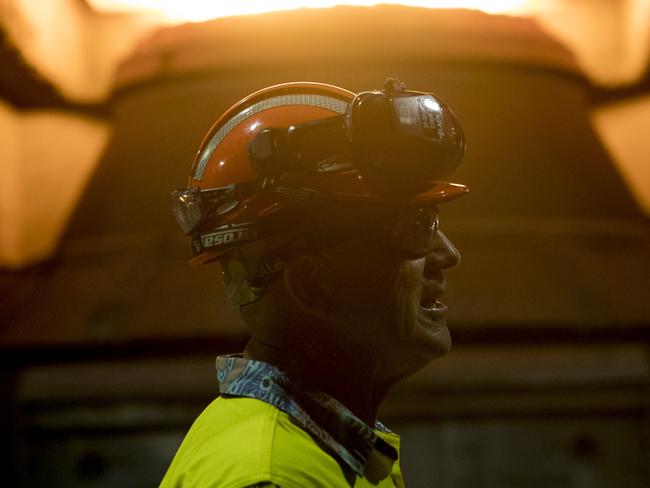 An employee in front of a steel furnace at BlueScope Steel Ltd. Port Kembla steelworks in Port Kembla, Australia, on Friday, Feb. 9, 2024. The world's two biggest miners, BHP Group Ltd. and Rio Tinto Group, are teaming up in a bid to develop Australia's first electric-smelting furnace, in what could prove an important step toward slashing emissions in the steel-making process. Photographer: Brent Lewin/Bloomberg