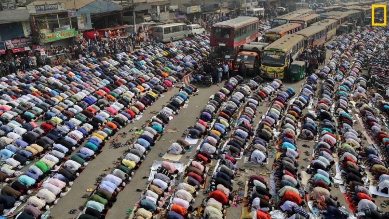 People pray on the street in Dhaka, Bangladesh during Ijtema. Bishwa Ijtema is one of the major Islamic religious gatherings observed annually in Dhaka, and millions of Muslims visit during this time. Picture: Sandipani Chattopadhyah /National Geographic Travel Photo Contest