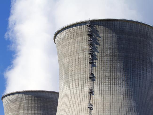 Nuclear power plant smoke, steam.