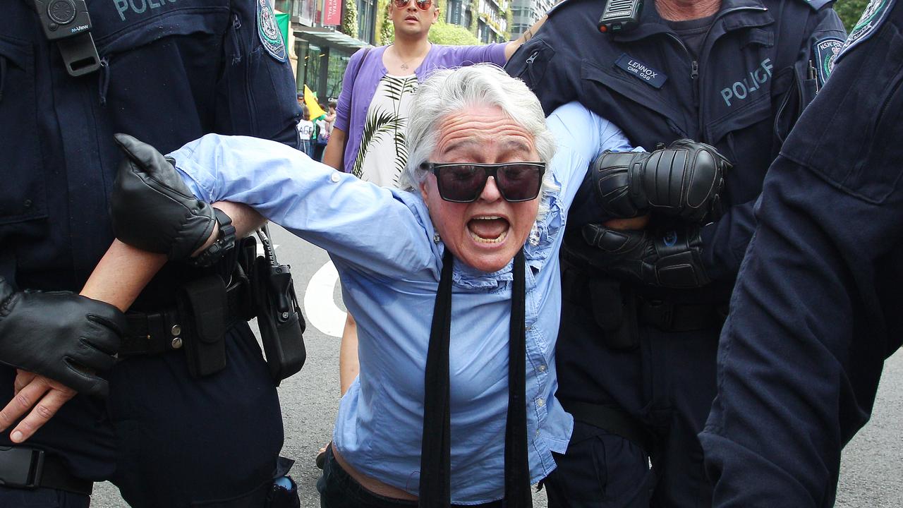 Police drag away former Peakhurst Greens councillor Anne Wagstaff who screamed in pain. Picture: Getty