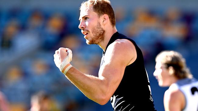 BRISBANE, AUSTRALIA - JULY 19: Harry McKay of Carlton celebrates kicking a goal during the round 7 AFL match between the Carlton Blues and the Port Adelaide Power at The Gabba on July 19, 2020 in Brisbane, Australia. (Photo by Bradley Kanaris/Getty Images)