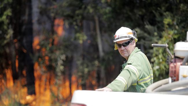 Michael Cassey, STT attending the fire front south of Geeveston. 2019 January Bushfires (Bush Fires). Picture: RICHARD JUPE