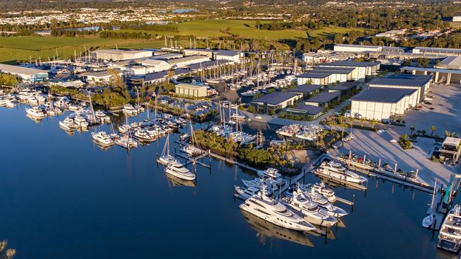 An artist impression of stages three and four of The Boat Works expansion. The services hub buildings are pictured right of centre with the four superyacht sheds behind the hub.