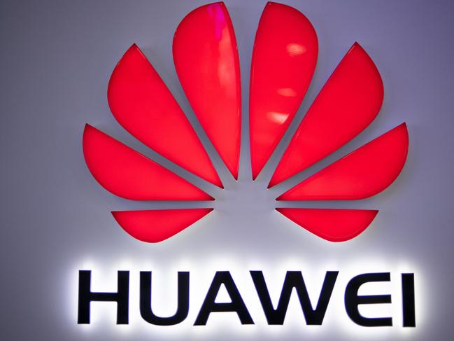 (FILES) In this file photo taken on May 27, 2019, a Huawei logo is displayed at a retail store in Beijing. - Two leading US senators warned President Donald Trump's administration on June 13, 2019 to not use Chinese telecommunications giant Huawei's access to the US market as a negotiating tool in trade talks with Beijing.  Republican Marco Rubio and Democrat Mark Warner, both members of the Senate Intelligence Committee, echoed rising concerns Trump could water down an effective ban on Huawei equipment in order to secure a trade pact with China. (Photo by FRED DUFOUR / AFP)