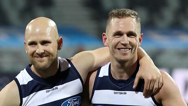 GEELONG, AUSTRALIA - JULY 04: Gary Ablett (L) and Joel Selwood of the Cats leave the field following victory in the round 5 AFL match between the Geelong Cats and the Gold Coast Suns at GMHBA Stadium on July 04, 2020 in Geelong, Australia. (Photo by Graham Denholm/AFL Photos via Getty Images )