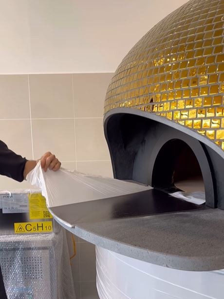 Rosie's Pizza is opening at Erindale Shopping Centre, featuring a gold-plated pizza oven. Picture: Supplied