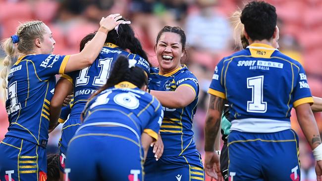 Parramatta’s NRLW side celebrates during their match against the Roosters on Sunday. Picture: Albert Perez/Getty Images