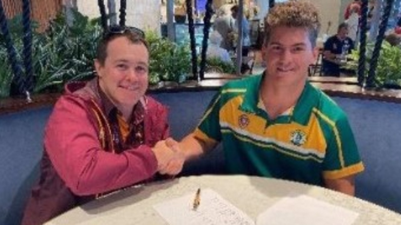 Brock Hinds with Brisbane Broncos elite development manager Michael Kennedy.