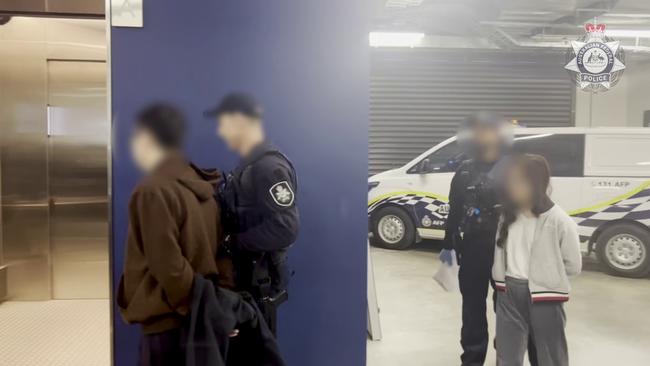 Police arrest suspects in Melbourne as part of Operation Avarus-Nightwolf.