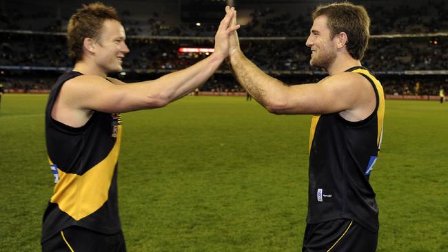 Joel Bowden and Nathan Brown celebrate a Tiger win.