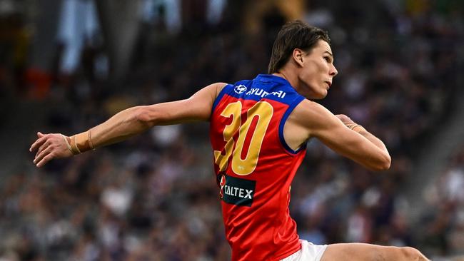 PERTH, AUSTRALIA - MARCH 17: Eric Hipwood of the Lions kicks the ball during the 2024 AFL Round 01 match between the Fremantle Dockers and the Brisbane Lions at Optus Stadium on March 17, 2024 in Perth, Australia. (Photo by Daniel Carson/AFL Photos via Getty Images)