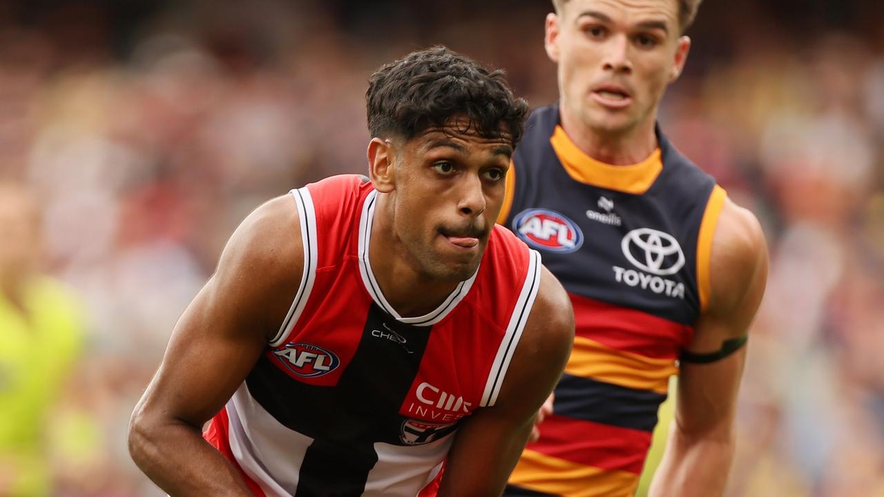 ADELAIDE, AUSTRALIA - MARCH 16: Nasiah Wanganeen-Milera of the Saints is tackled by Ben Keays of the Crows during the 2025 AFL Round 01 match between the Adelaide Crows and the St Kilda Saints at Adelaide Oval on March 16, 2025 in Adelaide, Australia. (Photo by James Elsby/AFL Photos via Getty Images)