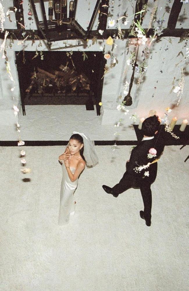 They held the ceremony in front of the fireplace. Picture: Instagram/arianagrande