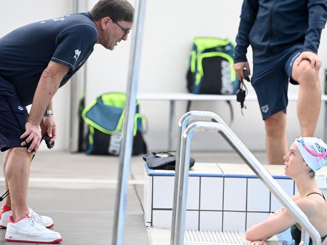 Michael Bohl talking to Emma McKeon at a training camp before the Tokyo Olympics. Picture: Delly Carr