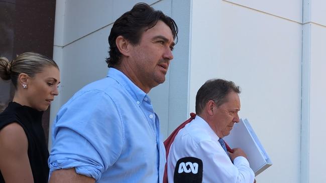 Outback Wrangler Matt Wright leaving the Supreme Court of the Northern Territory at Darwin on October 24, 2024, alongside his wife Kaia and his barrister David Edwardson. Picture: Zizi Averill