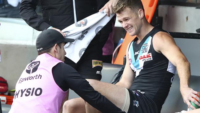 Robbie Gray speaks with Port Adelaide’s physio during Saturday’s loss to West Coast. Picture: Sarah Reed