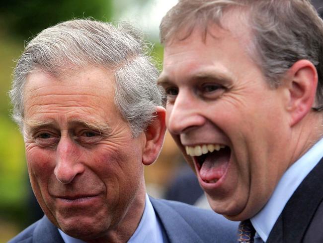 Prince Charles and his brother Prince Andrew share a joke in the days before Andrew’s Epstein friendship soured his life. Picture: AFP