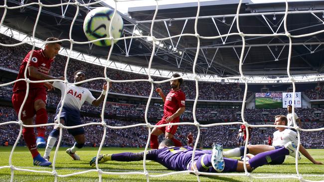 Roberto Firmino, left, fires home from close range for Liverpool’s second goal against Tottenham at Wembley. Picture: Getty Images