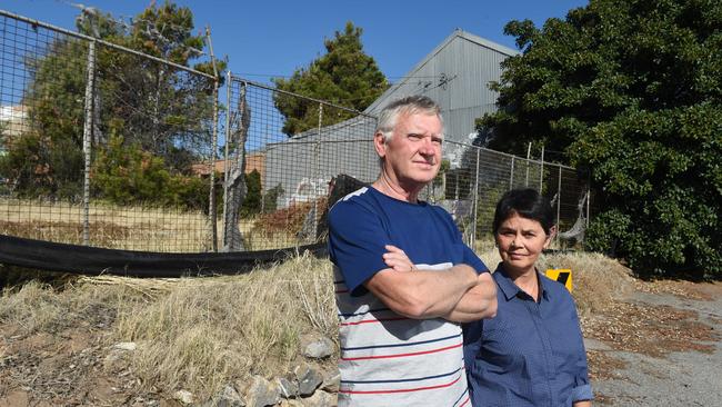 Residents, including John Parker and Felicity D'Rozario are fed up with Cement Hill looking like an ‘eyesore’ and not being secured. Picture Roger Wyman