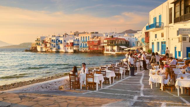 Outdoor dining on the island of Mykonos which is one of the hottest European destinations for Australian travellers Picture: Alamy