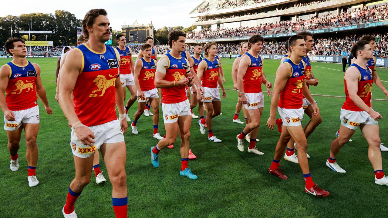 The Lions leave the field after their loss to Port Adelaide. Picture: James Elsby
