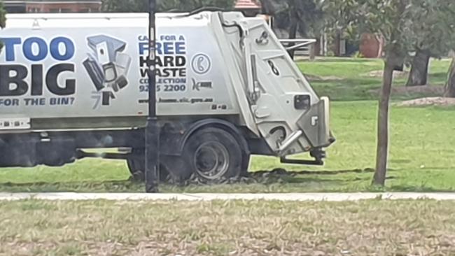 The bogged rubbish truck on Boydon Square oval.