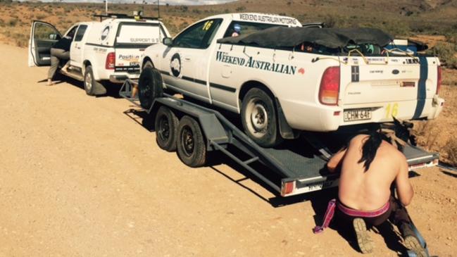 The Weekend Australian's ute, with a broken sump, is loaded on a trailer for the return to Adelaide. It has withdrawn from the Shitbox Rally.