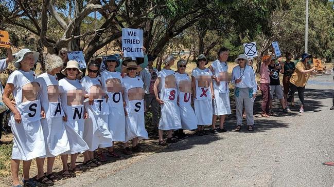 Three women were arrested after protesting bare-chested during the Tour Down Under in South Australia. Picture: Extinction Rebellion.