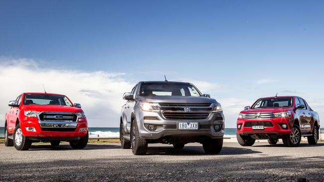 Deals on the Ford Ranger, left, aren’t as sharp as the Holden Colorado (centre) and Toyota HiLux (right) but it’s still worth a look. Picture: Thomas Wielecki.