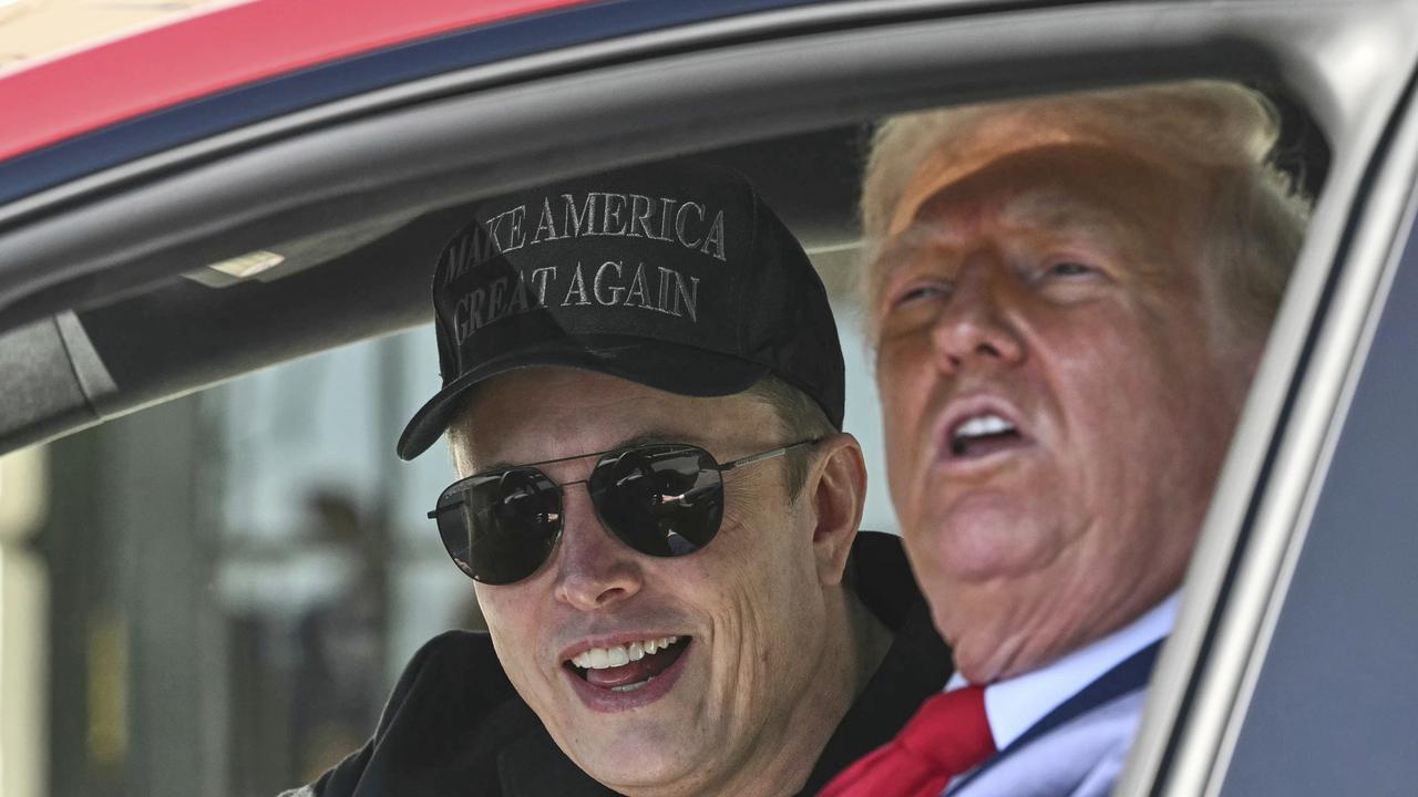 <!DOCTYPE html PUBLIC "-//W3C//DTD HTML 4.0 Transitional//EN" "http://www.w3.org/TR/REC-html40/loose.dtd"><html><body><p>The March 11, 2025 photo opportunity saw Trump and Musk sitting inside one of the electric vehicles. Picture: AP</p></body></html>