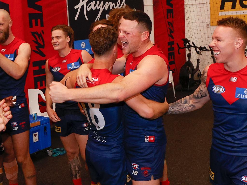 Jake Melksham and Steven May share the love after the Dees’ win. Picture: Michael Willson/AFL Photos/Getty Images